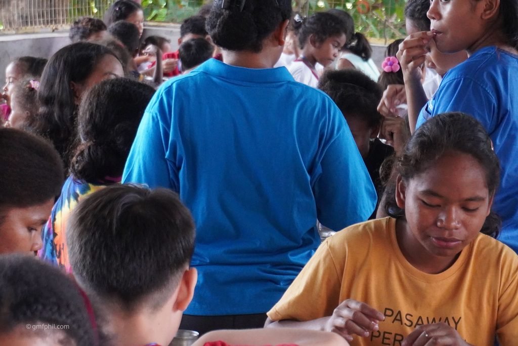 Older student eating meal.